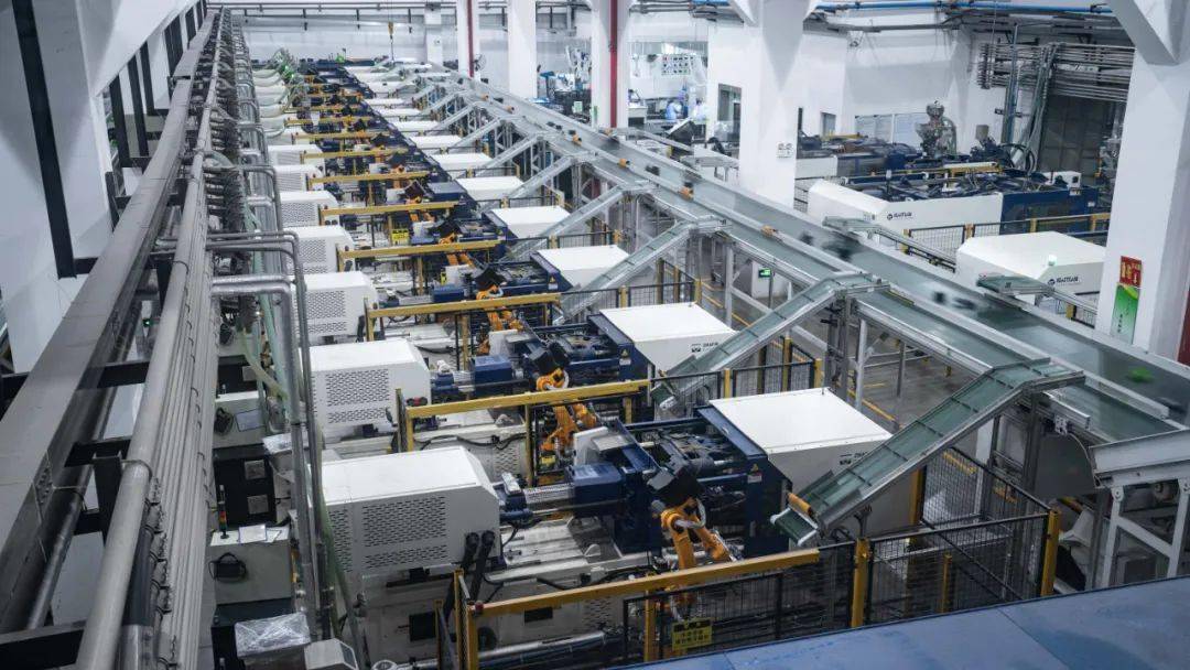 Injection molding workshop with automated machines